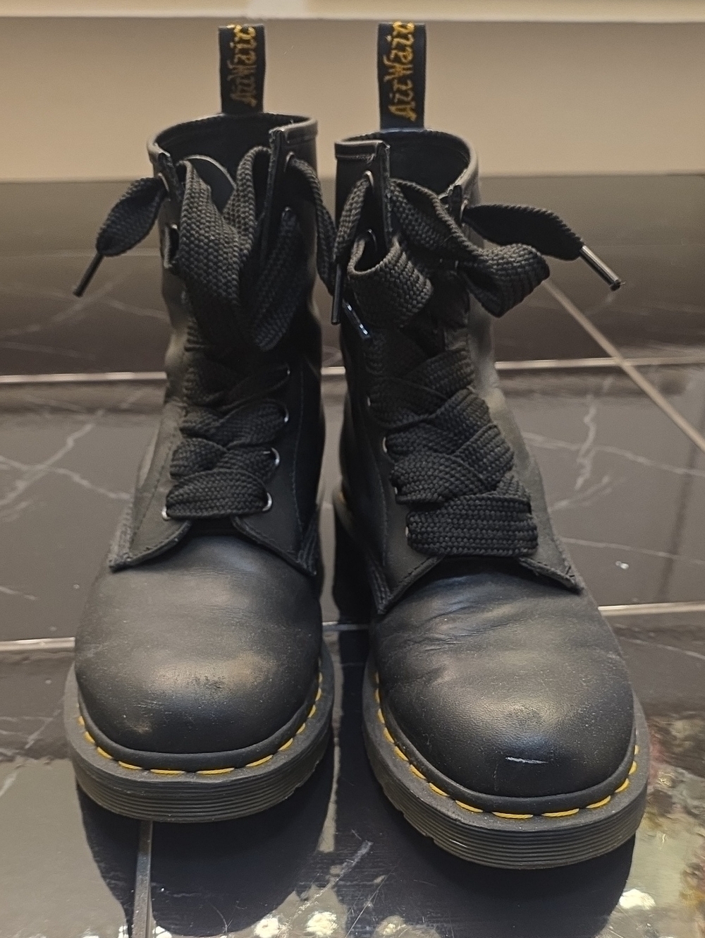 Dr. Martens Black Leather Combat Boots with Yellow Stitching